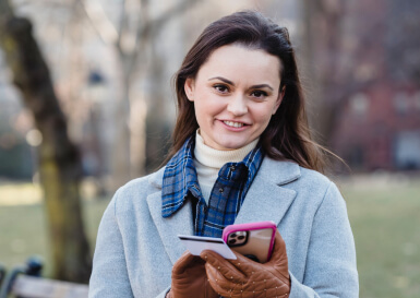 woman-with-cell-phone-on-park-bench-Live-Body-Cam-1